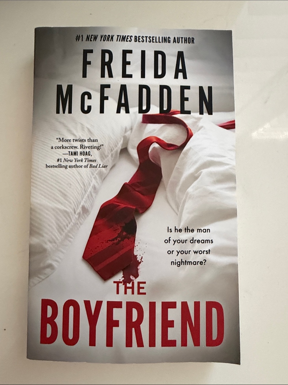 The Boyfriend by Freida McFadden - White & Red Paperback Thriller
